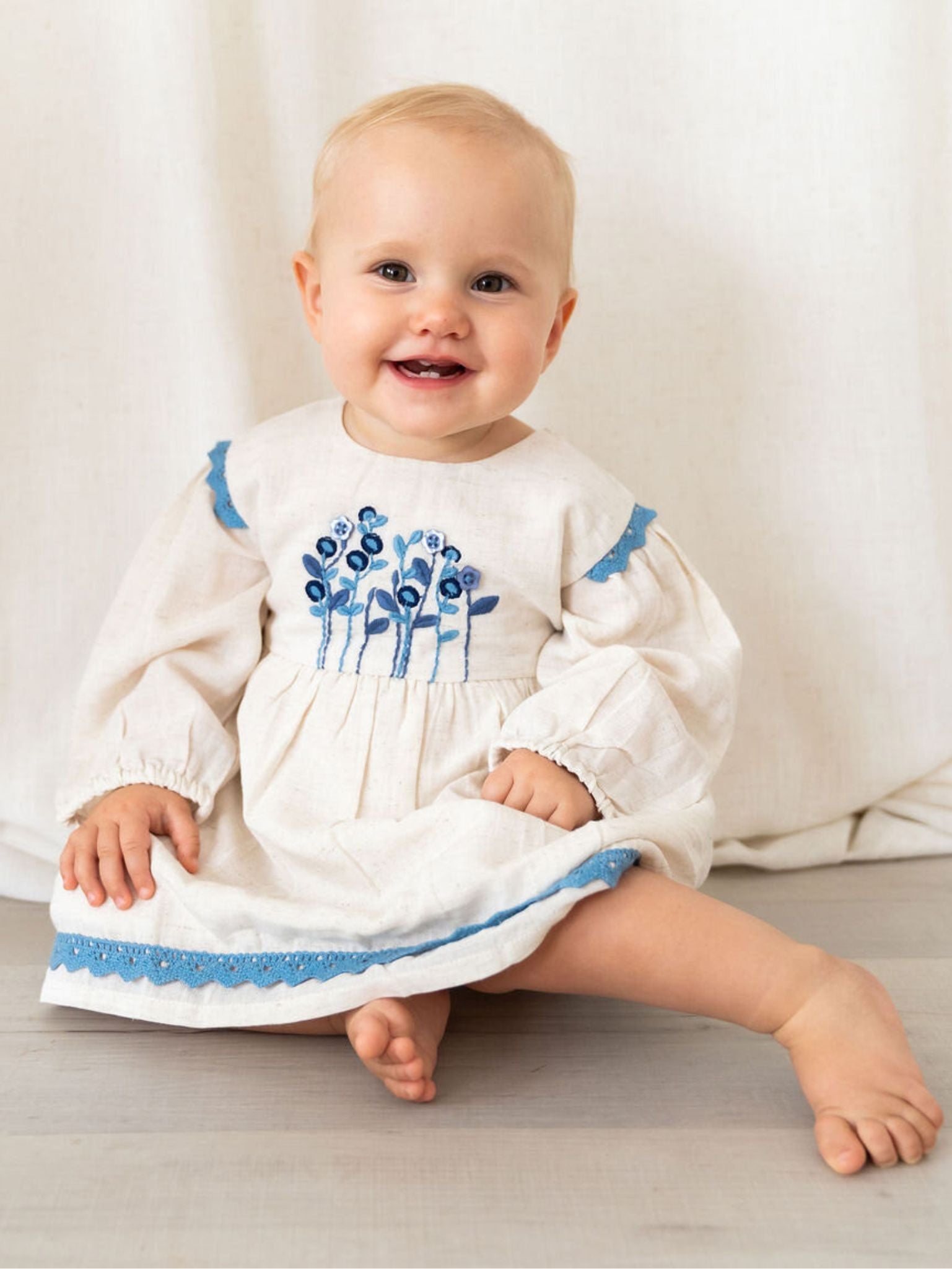 baby girl embroidered dress The Athena Embroidered Wildflower Birthday Dress main image 1